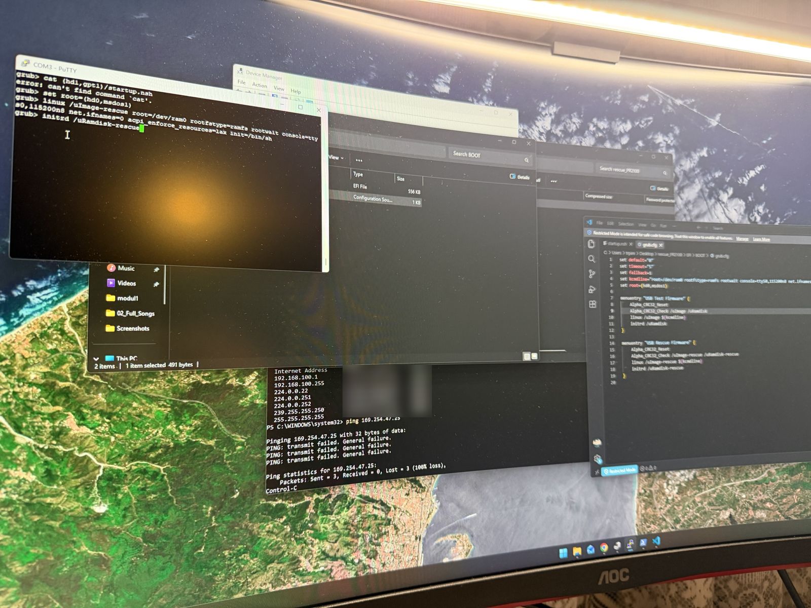 PuTTY session at a GRUB prompt manually loading the rescue kernel and initrd